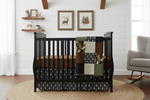 Close-up camo duck hunting nursery with ladder blanket pattern
