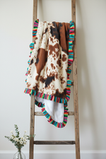 Cow Serape Leopard Blanket Lifestyle on Ladder