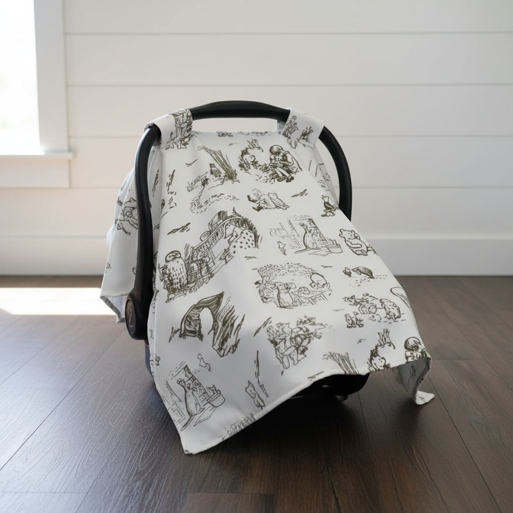 Pooh Toile Storybook Carseat Tent against white shiplap wall — brown toile Winnie the Pooh storybook print with brown cotton underside, handmade in the USA