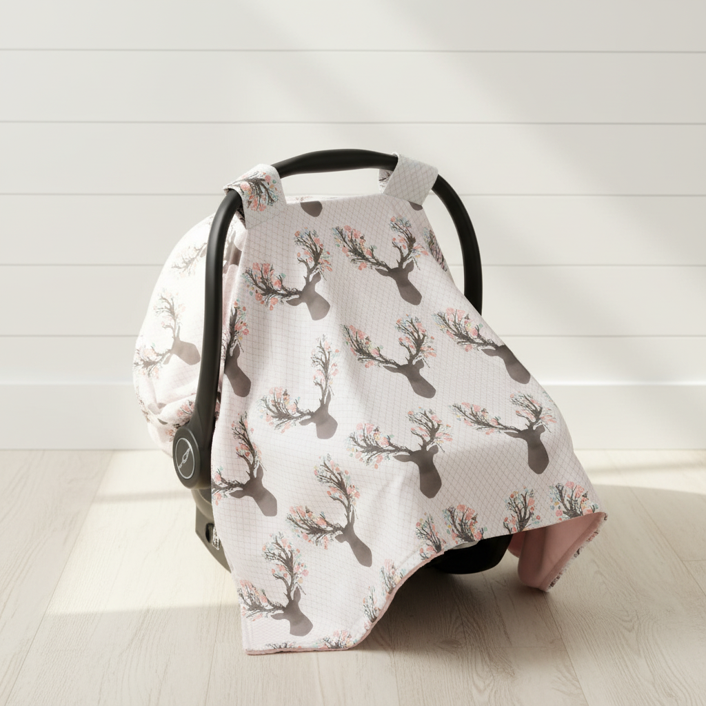 Tulip Fawn Deer Woodland Carseat Tent against white shiplap wall — floral fawn deer print with blush cotton underside, handmade in the USA