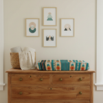 Teal Aztec Western Changing Pad Cover on Brown Dresser with Wall Art